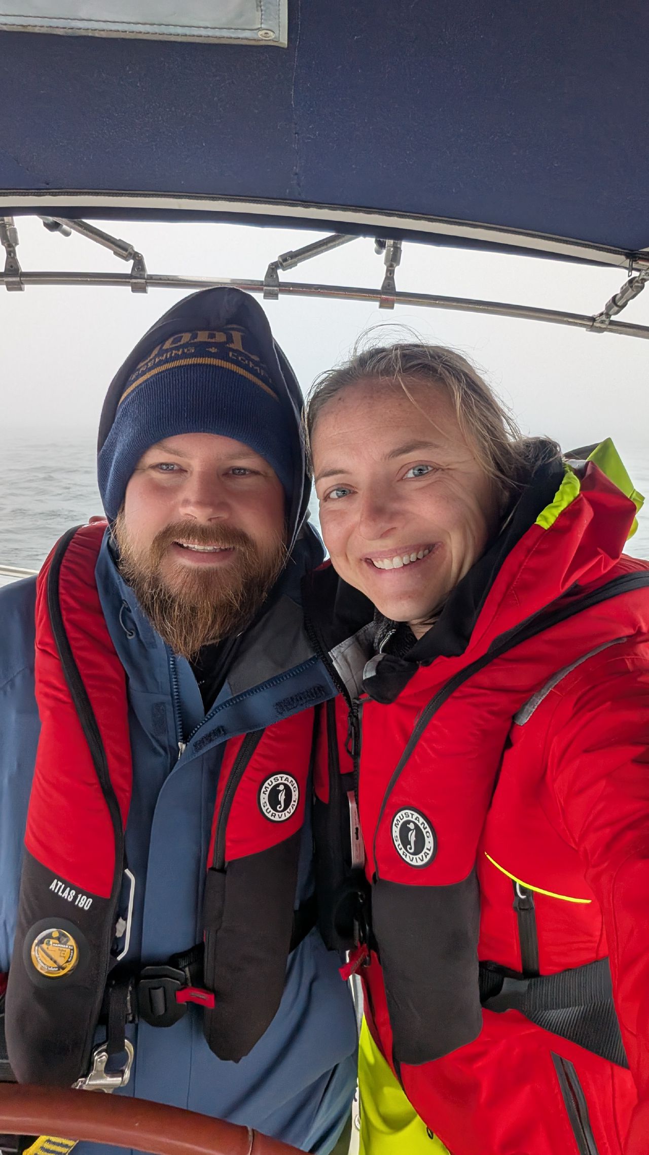 Brian and Rachel selfie in life jackets during a foggy passage north of Vancouver Island