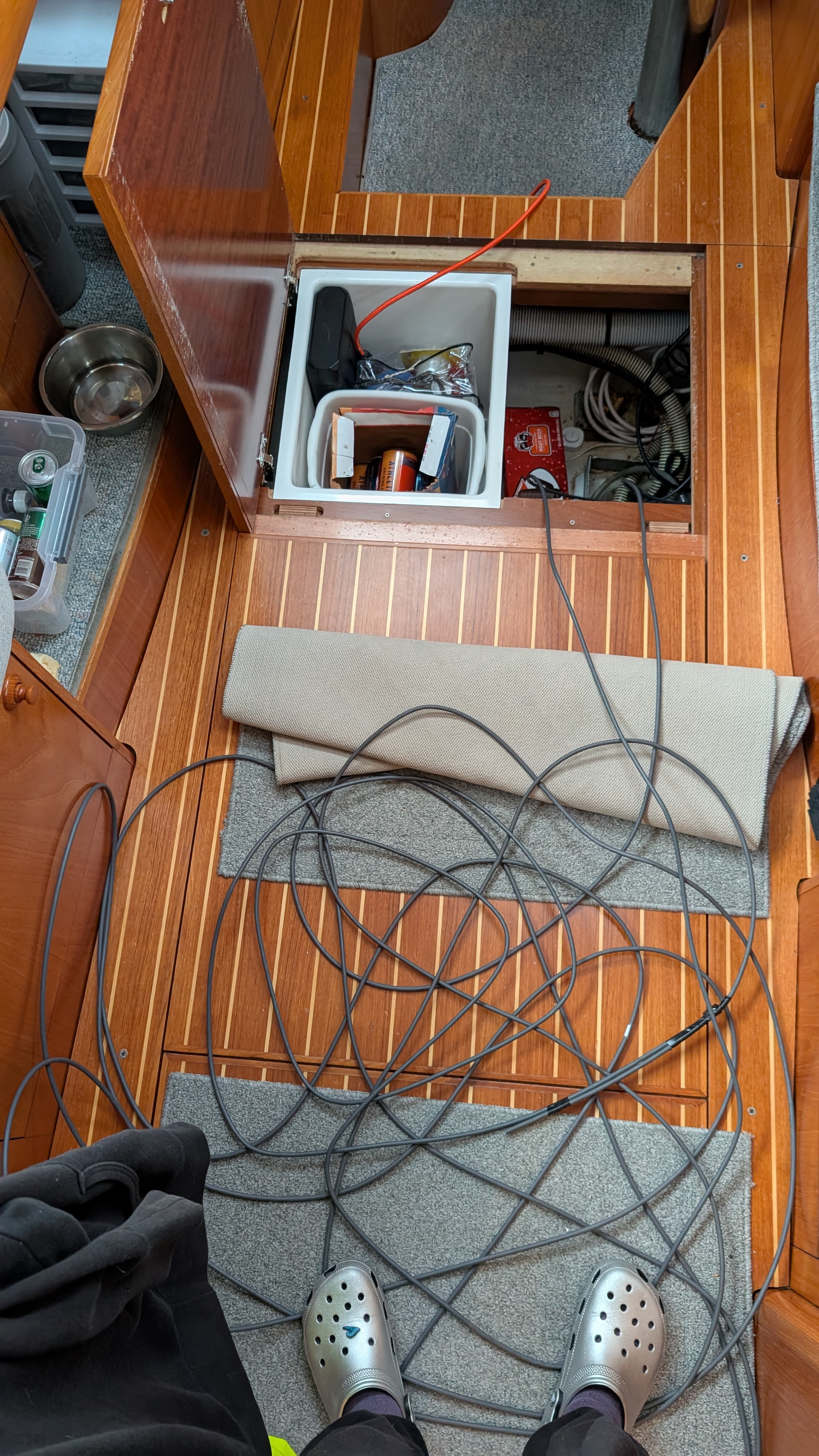 New Starlink cable routed through the cabin floor with a floor panel removed