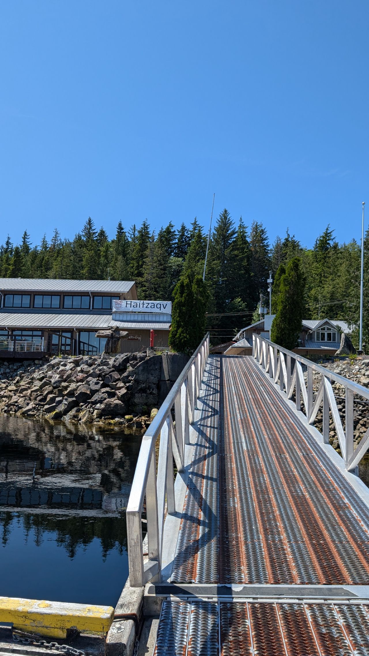 Metal dock ramp leading up to the Haitzaqv building at Shearwater on a sunny day