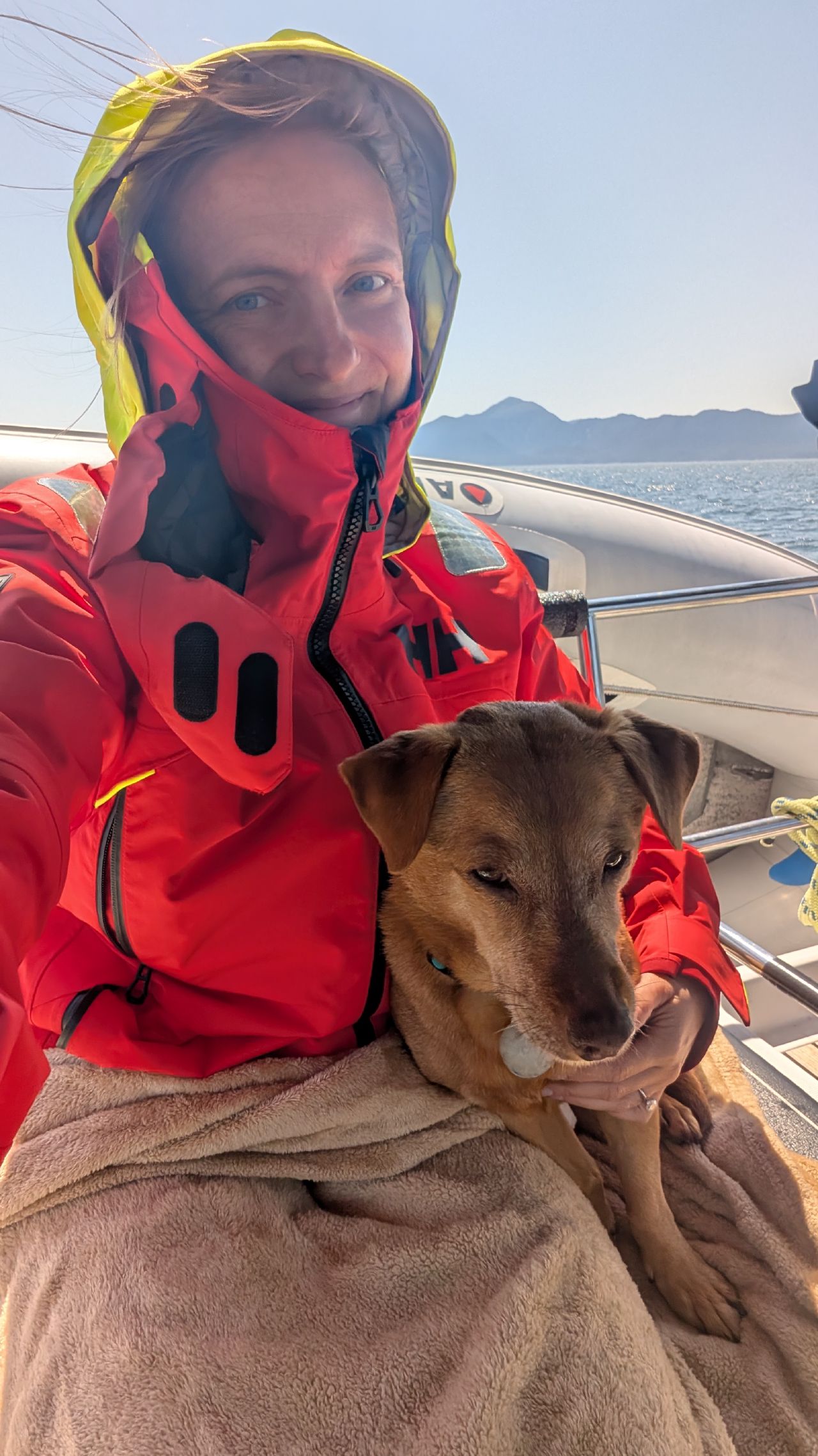 Rachel and Maui bundled up in foul weather gear during the passage to Hartley Bay
