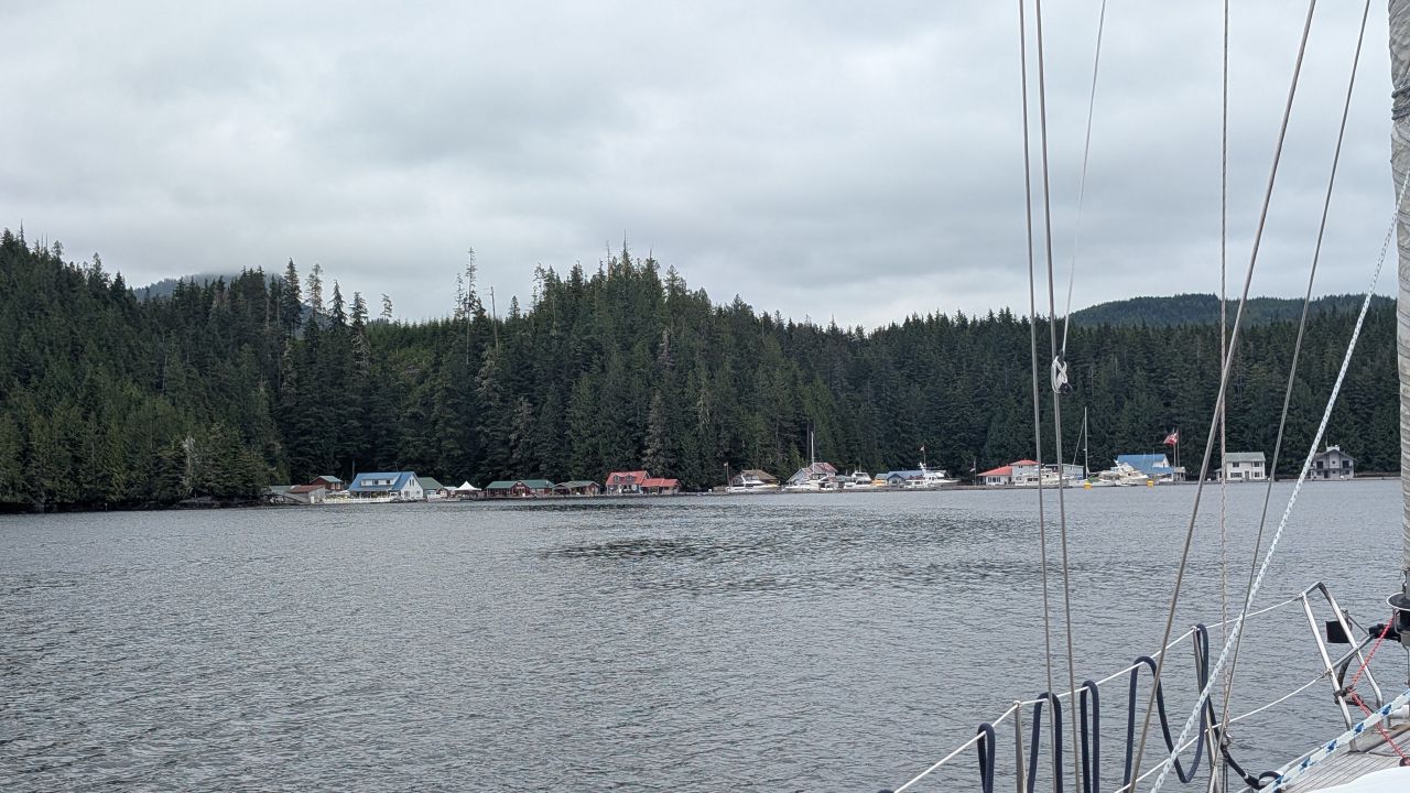 Approaching the floating community of Sullivan Bay from the sailboat on an overcast day